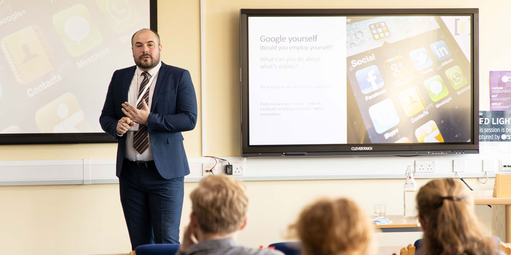 Jordan Canter deliveirng a lecture at Plymouth Marjon University